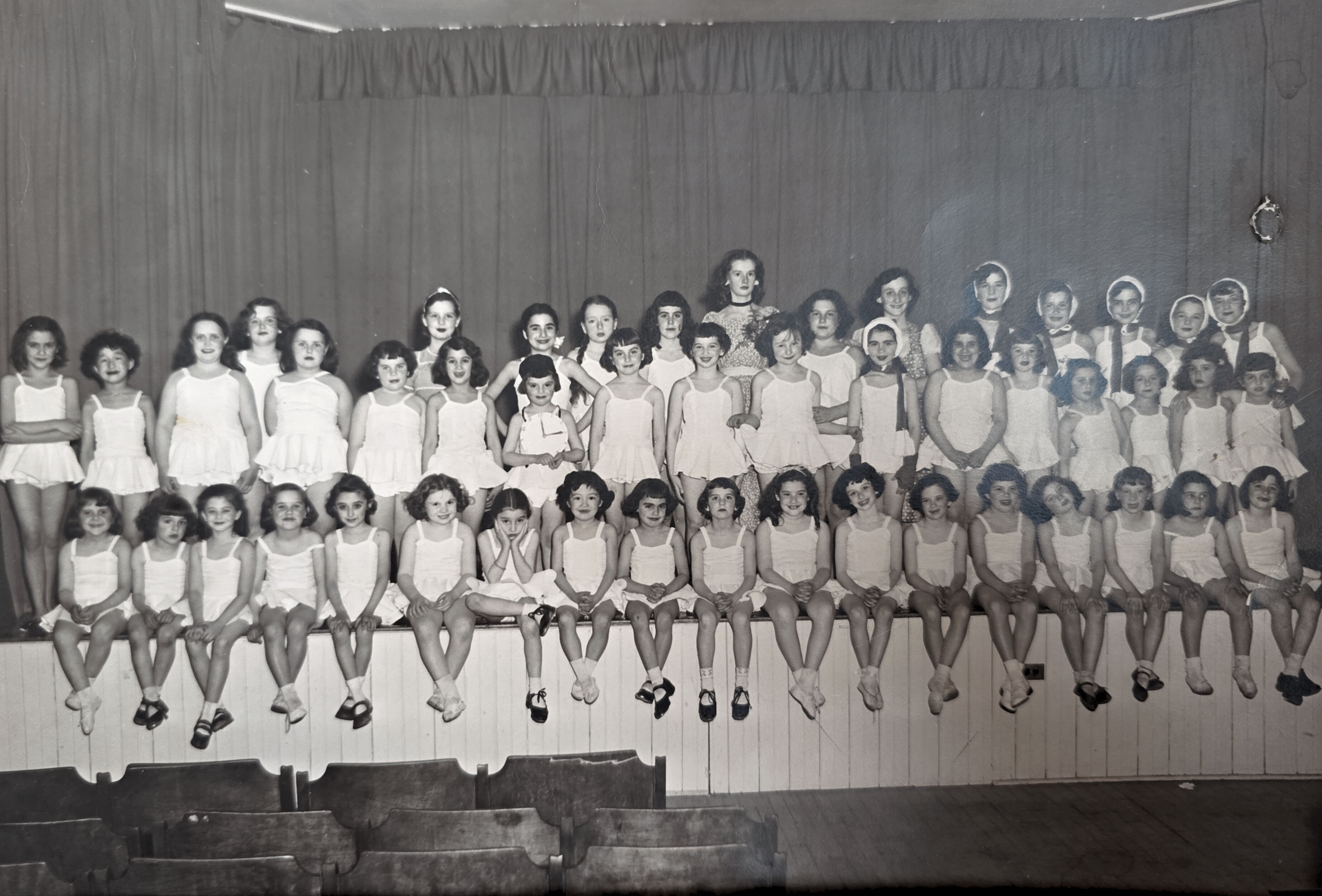 An archival school performance group photograph